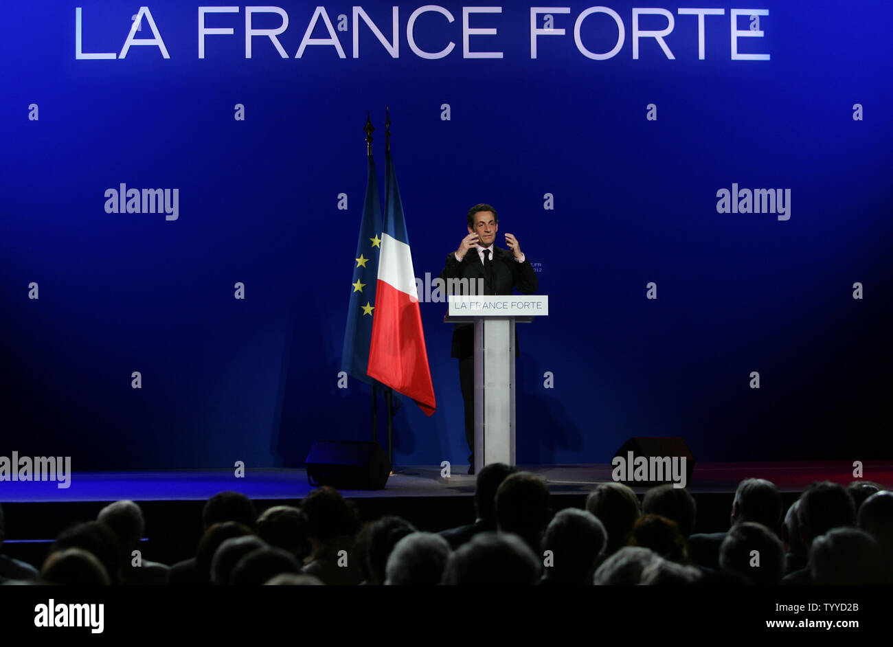French President Nicolas Sarkozy campaigns at a public meeting on March 28, 2012 in Elancourt, near Paris, France. Polls showed that the conservative candidate has caught up with his Socialist challenger in the first round of a presidential election next month. UPI/Eco Clement Stock Photo