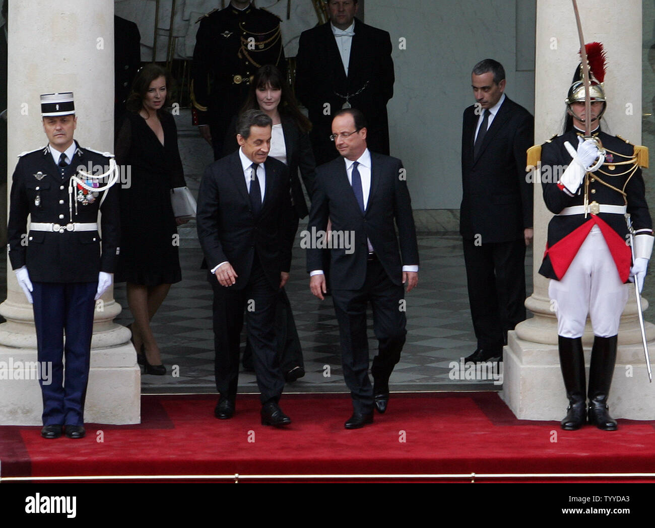 France S New President Francois Hollande R Bids Farewell To Outgoing President Nicolas Sarkozy On The Steps Of The Elysee Palace In Paris France On May 15 2012 In The Background Their Respective