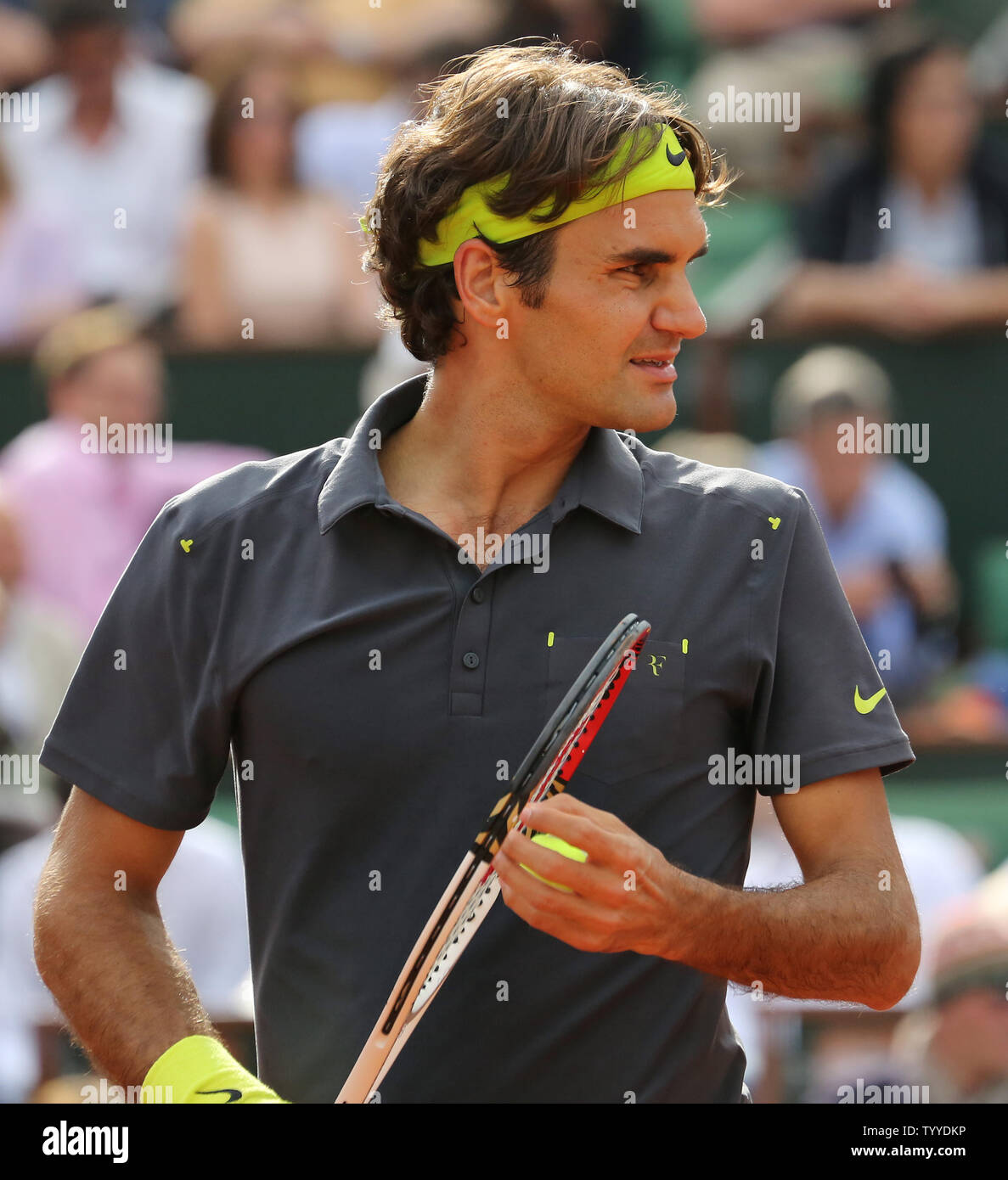 Roger Federer of Switzerland pauses during his French Open mens third round  match against Frenchman Nicolas Mahut at Roland Garros in Paris on June 1,  2012. Federer defeated Mahut 6-3, 4-6, 6-2,