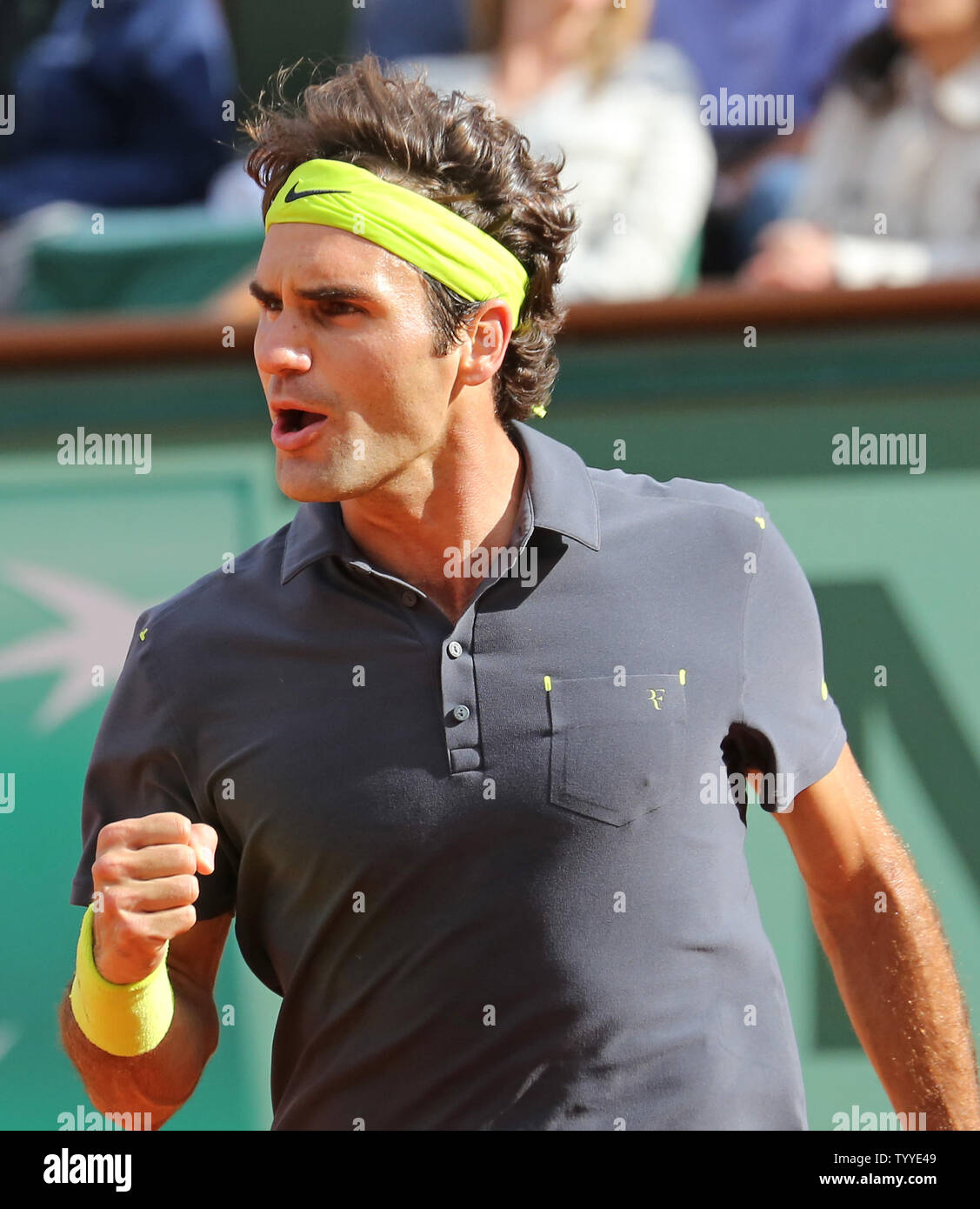 Roger Federer of Switzerland reacts after a shot during his French Open  men's semifinal match against Serbian Novak Djokovic at Roland Garros in  Paris on June 8, 2012. Djokovic defeated Federer 6-4,