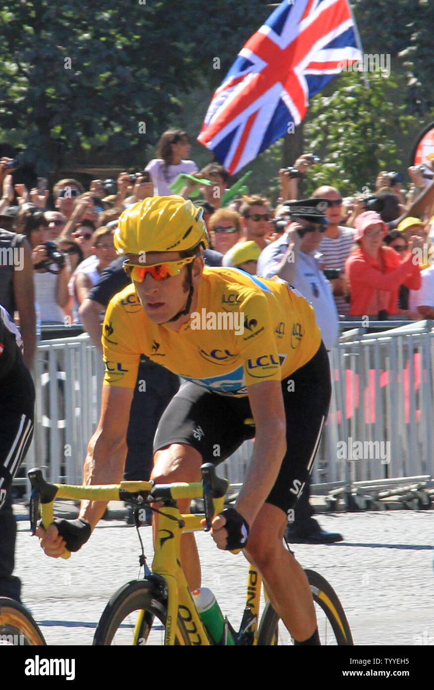 Bradley Wiggins Rides Along The Champs Elysees En Route To Winning His Bradley Wiggins Rides Along The Champs Elysees En Route To Winning His
