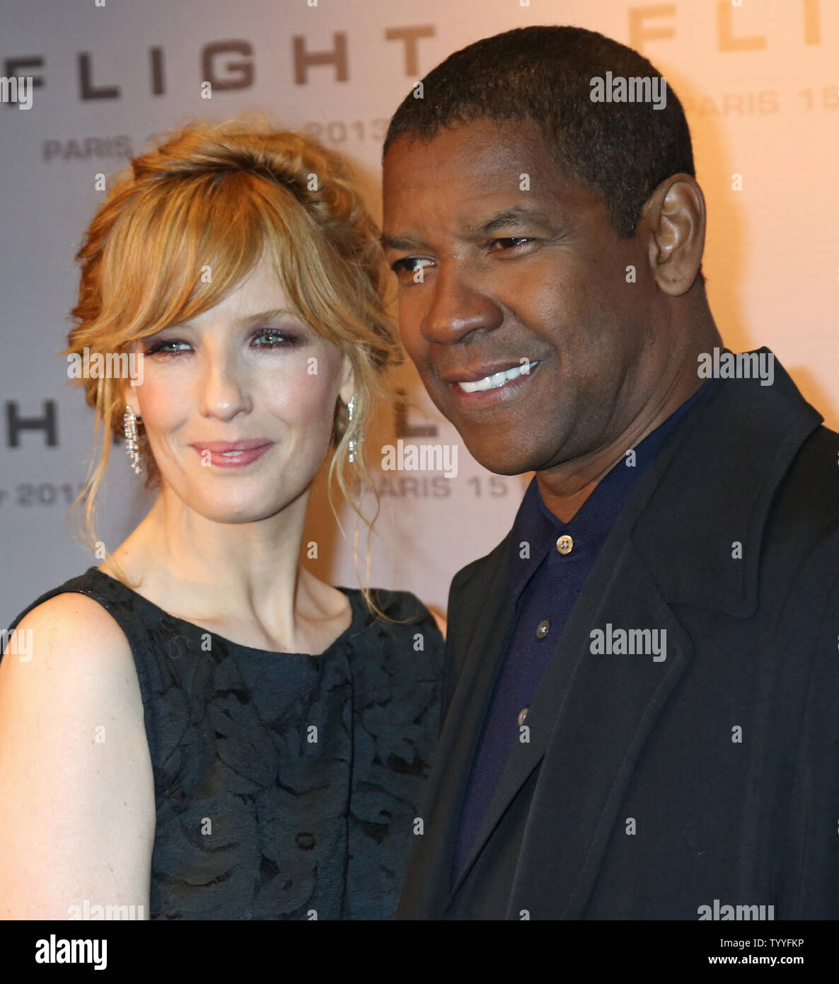 Kelly Reilly (L) and Denzel Washington arrive at the French premiere of the film 'Flight' in Paris on January 15, 2013.   UPI/David Silpa. Stock Photo