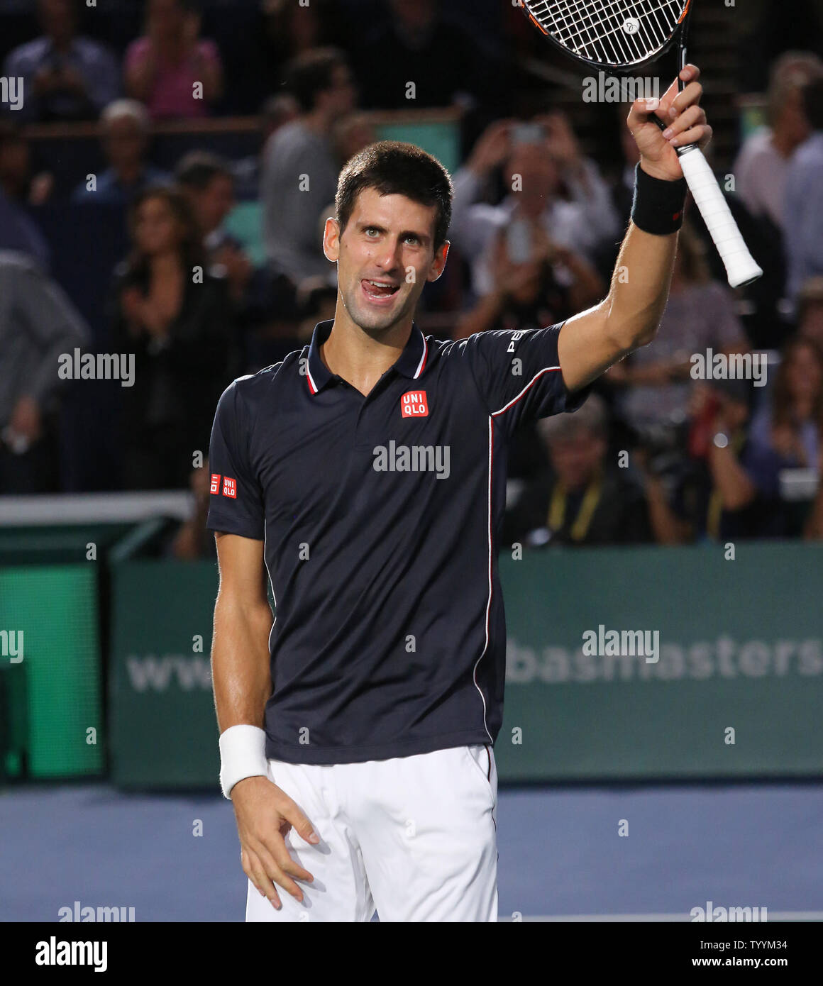 Novak Djokovic of Serbia acknowledges the crowd after winning his finals  match against Milos Raonic of Canada at the BNP Paribas Masters in Paris on  November 2, 2014. Djokovic defeated Raonic 6-2,