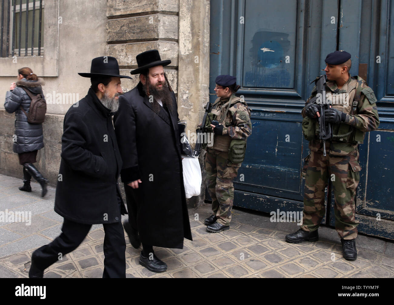 Security forces keep vigil in front of a Yeshiva near rue des Rosiers in Paris, on January 12, 2015. Security has been reinforced in Jewish areas of the capital after the terror attack at the Hyper Casher grocery store which left four Jews dead.  Photo by Maya Vidon-White/UPI Stock Photo