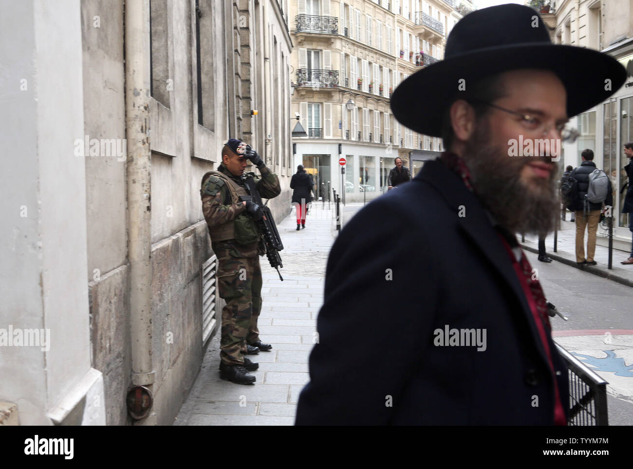 Security forces keep vigil in front of a Yeshiva near rue des Rosiers in Paris, on January 12, 2015. Security has been reinforced in Jewish areas of the capital after the terror attack at the Hyper Casher grocery store which left four Jews dead.  Photo by Maya Vidon-White/UPI Stock Photo