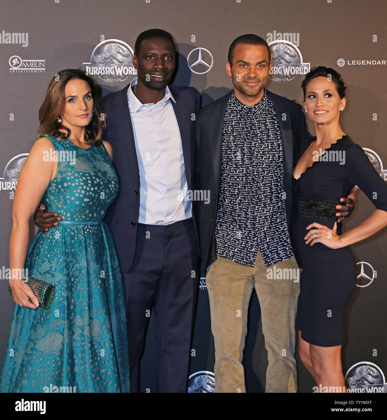 (From L to R) Helene Sy, Omar Sy, Tony Parker and Axelle Francine arrive at the world premiere of the film 'Jurassic World' in Paris on May 29, 2014.   Photo by David Silpa/UPI Stock Photo