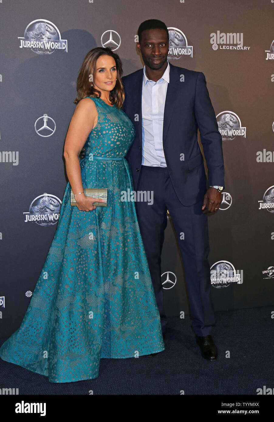 Helene Sy and Omar Sy arrive at the world premiere of the film 'Jurassic World' in Paris on May 29, 2014.   Photo by David Silpa/UPI Stock Photo