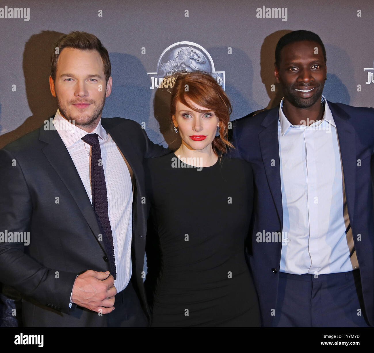 Chris Pratt (L), Bryce Dallas Howard (C) and Omar Sy arrive at the world premiere of the film 'Jurassic World' in Paris on May 29, 2014.   Photo by David Silpa/UPI. Stock Photo