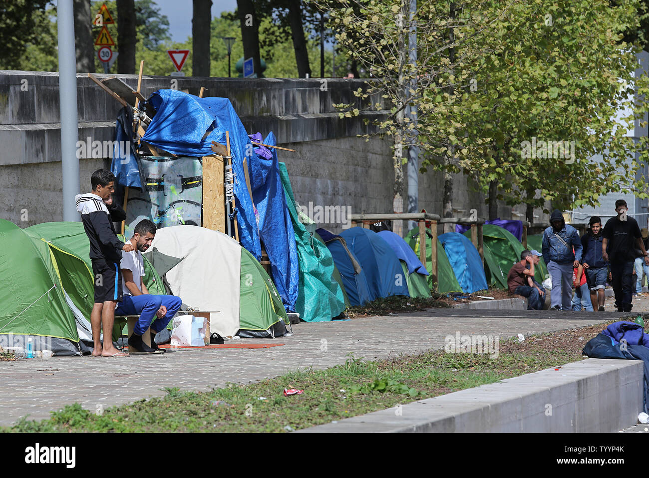 A makeshift migrant camp is seen along the banks of the Seine river near  Gare d'Austerlitz in Paris on September 4, 2015. The camp shelters refugees  from over 40 different countries, mainly