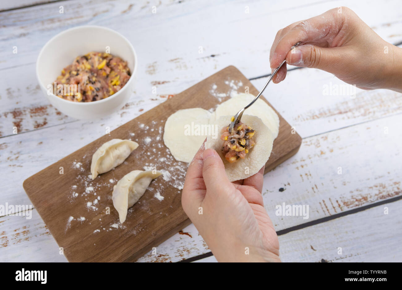 Dumpling cook hi-res stock photography and images - Alamy