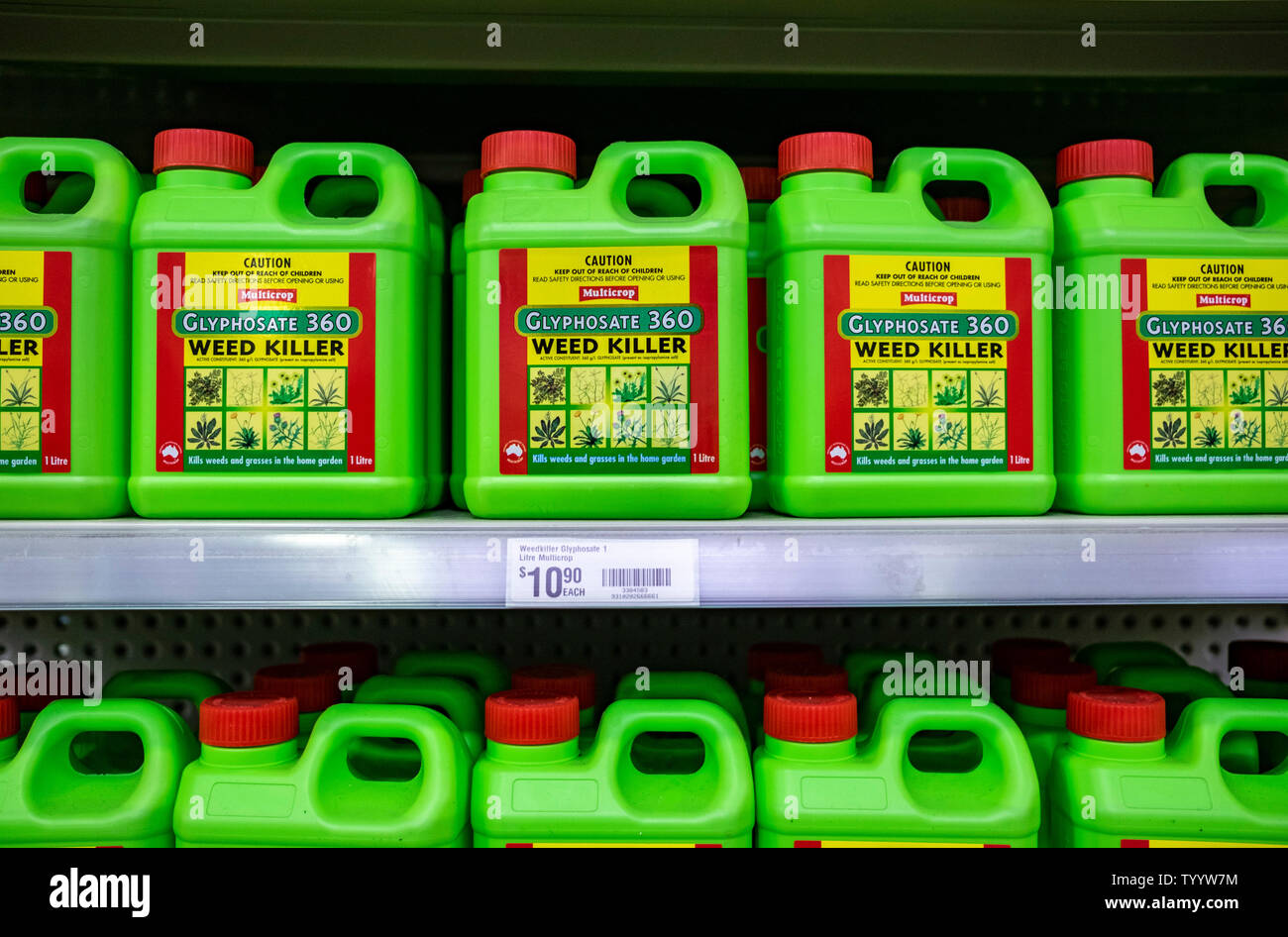 Containers of glyphosate herbicide on sale in the garden section of an Australian hardware store. Stock Photo
