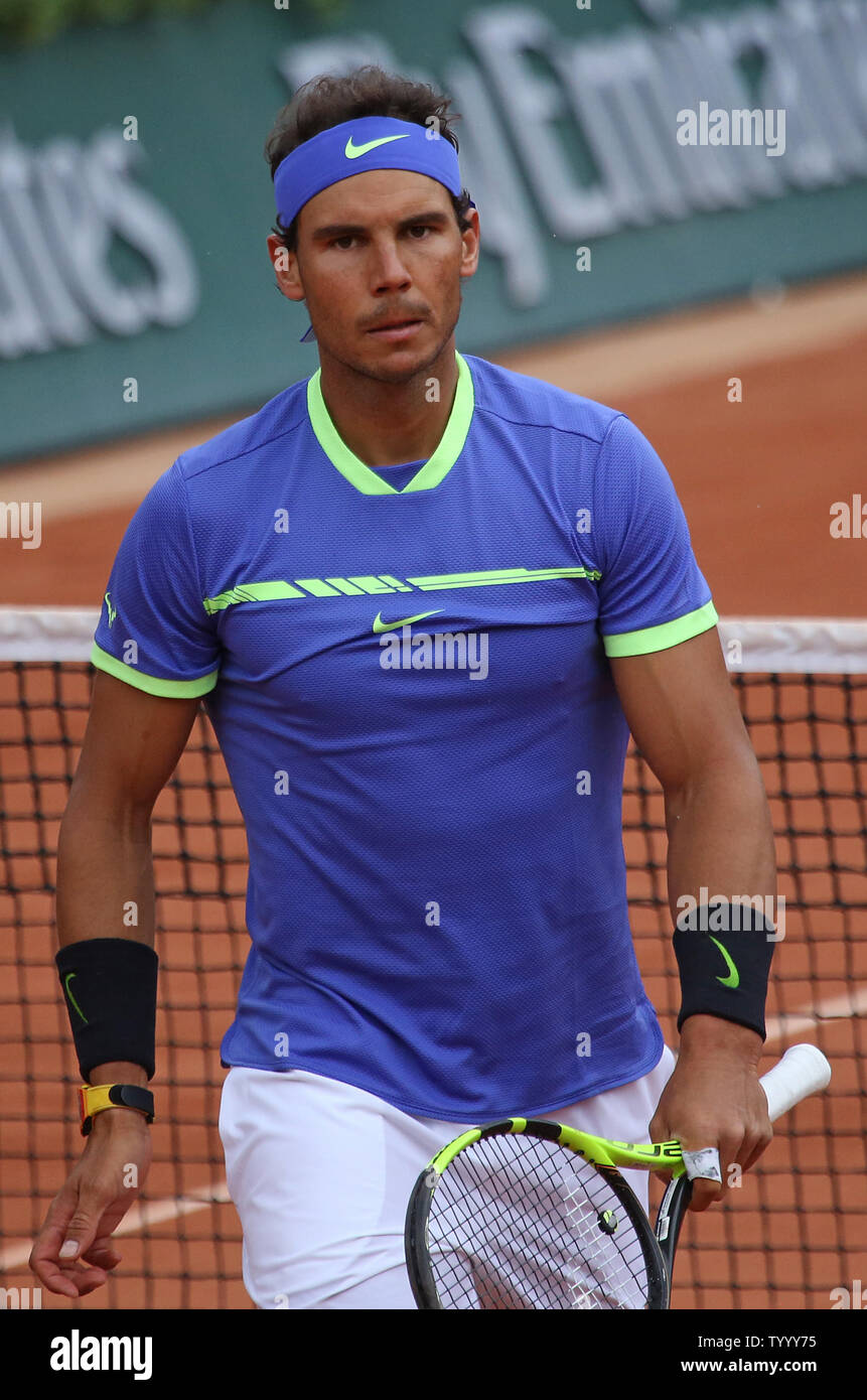 Rafael Nadal of Spain pauses during his French Open men's quarterfinal  match against Pablo Carreno Busta of Spain at Roland Garros in Paris on  June 7, 2017. Nadal advanced to the semifinals