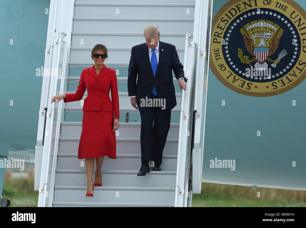 U.S. President Donald Trump and First Lady Melania Trump arrive at Orly Airport in Paris on July 13, 2017. President Trump will meet with French President Emmanuel Macron to discuss counter-terrorism, the Syrian civil war and attend the Bastille Day military parade during his visit.   Photo by David Silpa/UPI Stock Photo