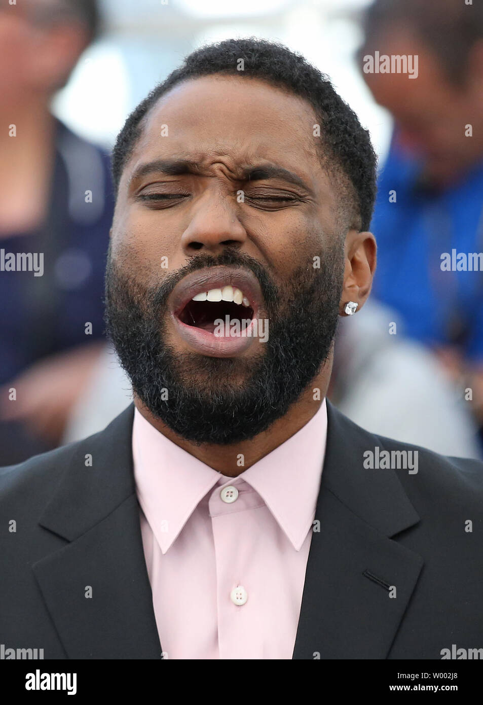 John David Washington arrives at a photocall for the film
