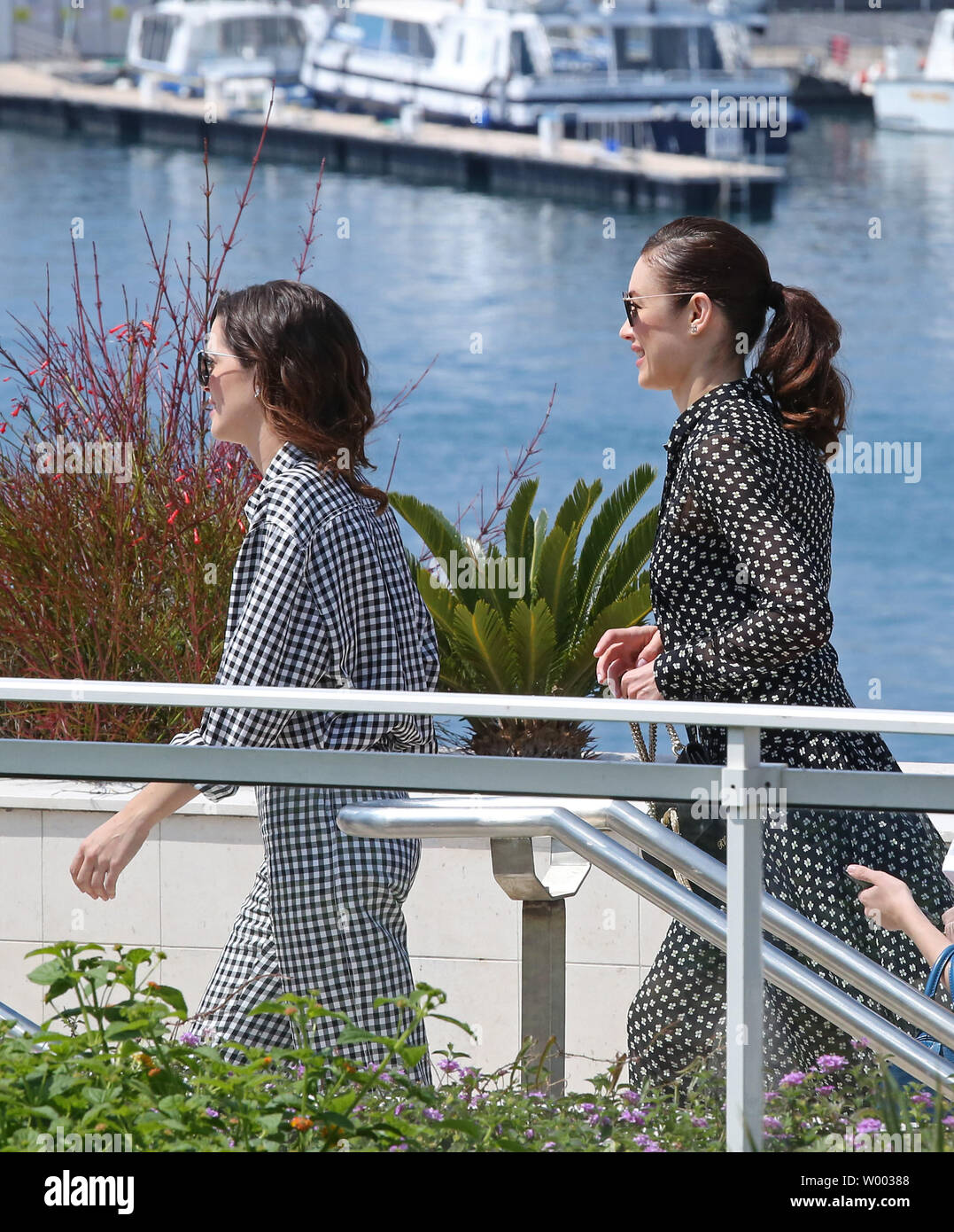Joana Ribeiro (L) and Olga Kurylenko arrive at a photocall for the film 'The Man Who Killed Don Quixote' during the 71st annual Cannes International Film Festival in Cannes, France on May 19, 2018.  Photo by David Silpa/UPI Stock Photo