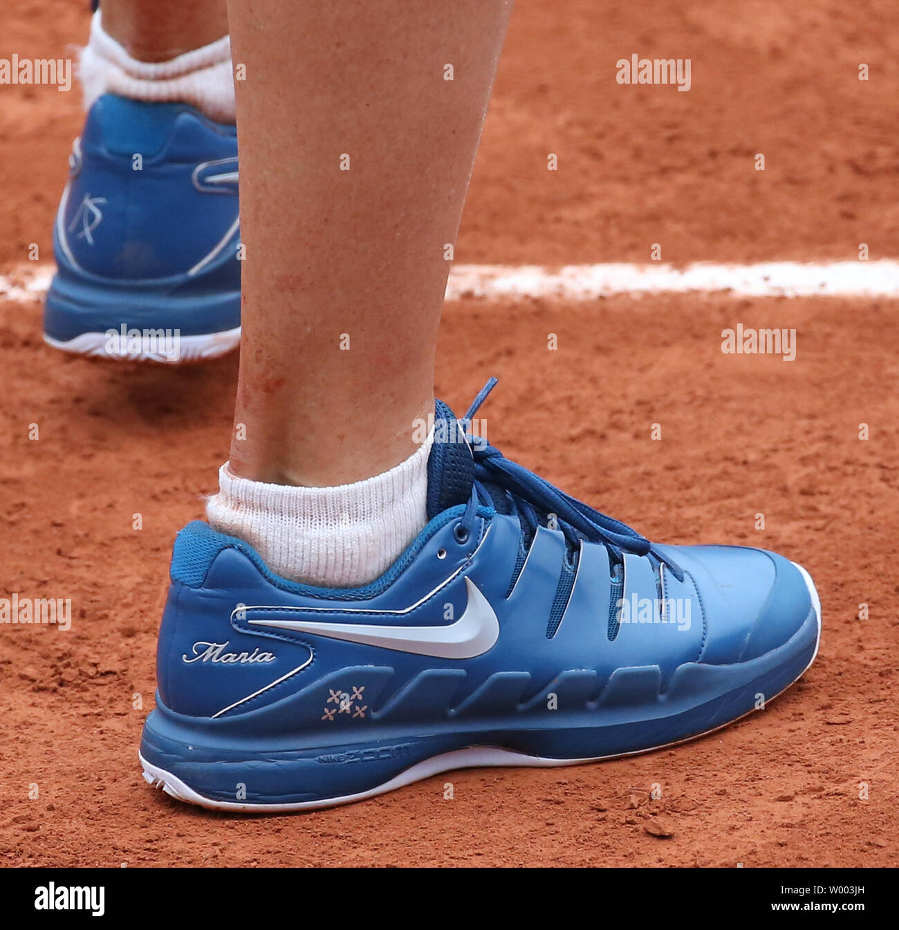 The shoes of Maria Sharapova of Russia are seen during her French Open  women's first round match against Richel Hogenkamp of The Netherlands at  Roland Garros in Paris on May 29, 2018.
