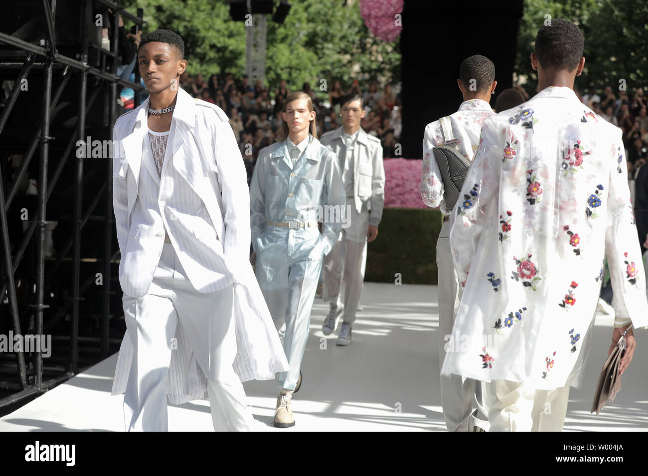 A model takes to the catwalk during the presentation of Dior's show as ...