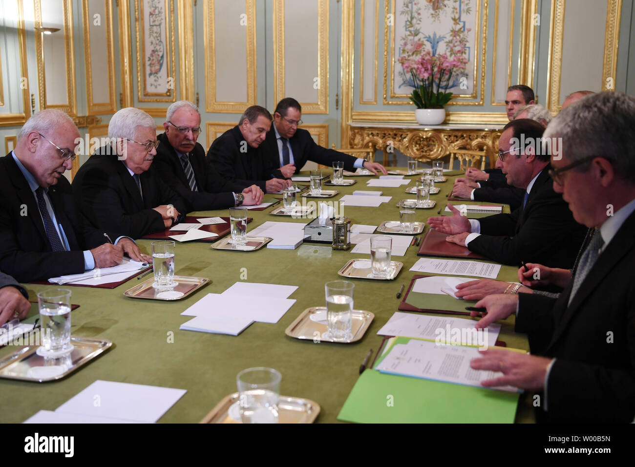 Palestinian President Mahmoud Abbas (Abu Mazen) (L) meets with French President Francois Hollande in Paris on July 21, 2016.     Photo by Thaer Ghanaim Stock Photo