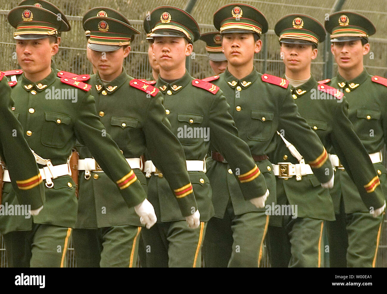 Chinese People's Liberation Army Soldiers (PLA) march through the ...