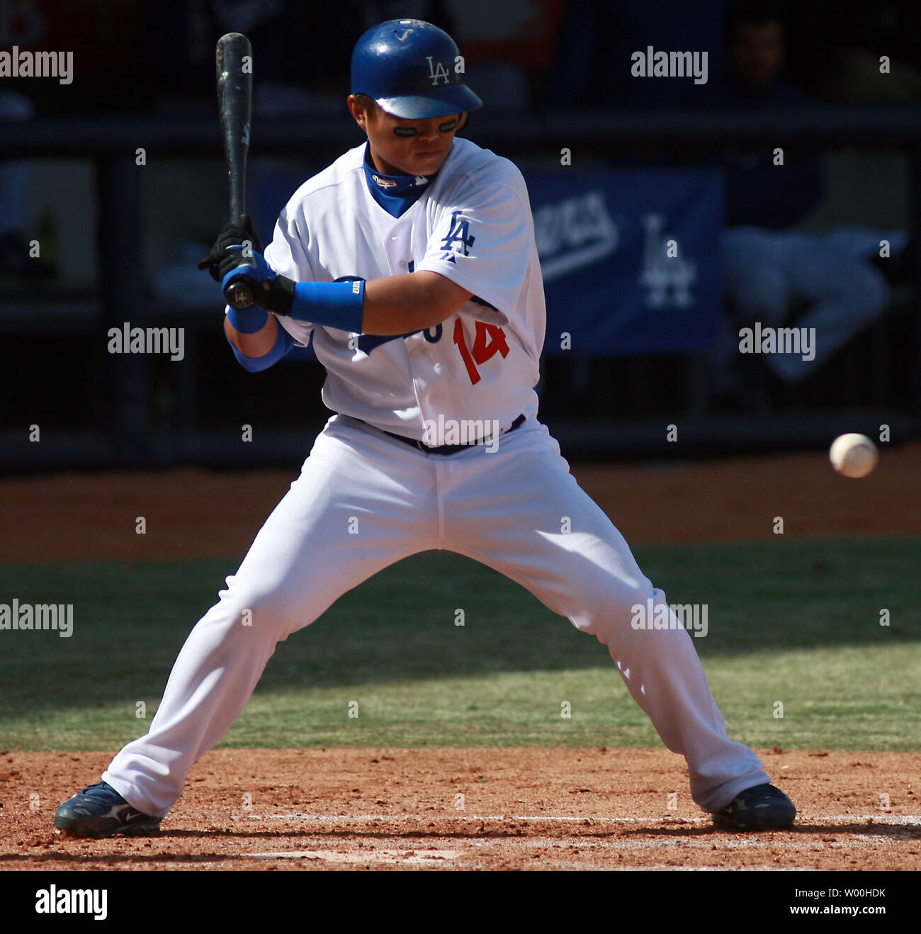 Los Angeles Dodgers Chin-lung Hu swings at a ball during an exhibition game against the San Diego Padres at Wukesong Stadium in Beijing March 15, 2008. The Dodgers and Padres shared the honors when Major League Baseball made its debut in China with a spring-training tied game.  (UPI Photo/Stephen Shaver) Stock Photo