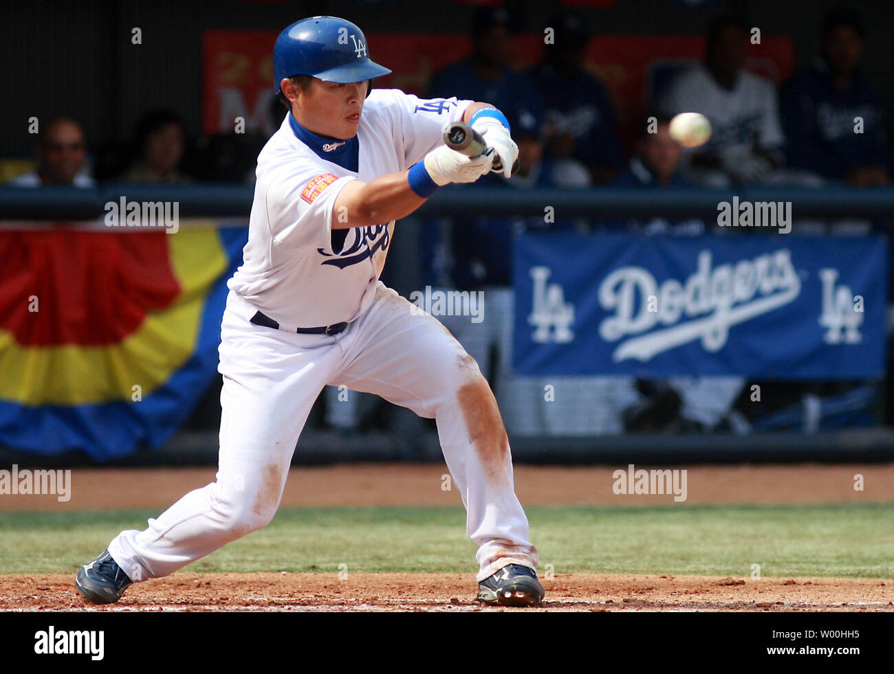 Los Angeles Dodgers' Chin-lung Hu attempts to bunt during their second game against the San Diego Padres in the 2008 Major League Baseball (MLB) China Series at Wukesong Stadium in Beijing March 16, 2008. The San Diego Padres beat the Los Angeles Dodgers 6-3.  (UPI Photo/Stephen Shaver) Stock Photo