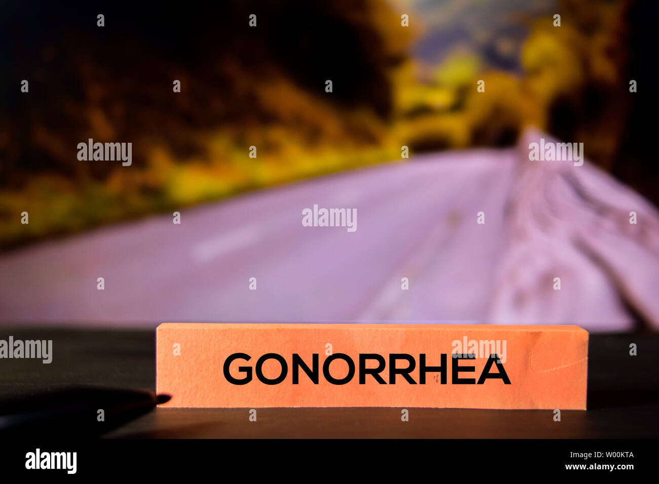 Gonorrhea on the sticky notes with bokeh background Stock Photo