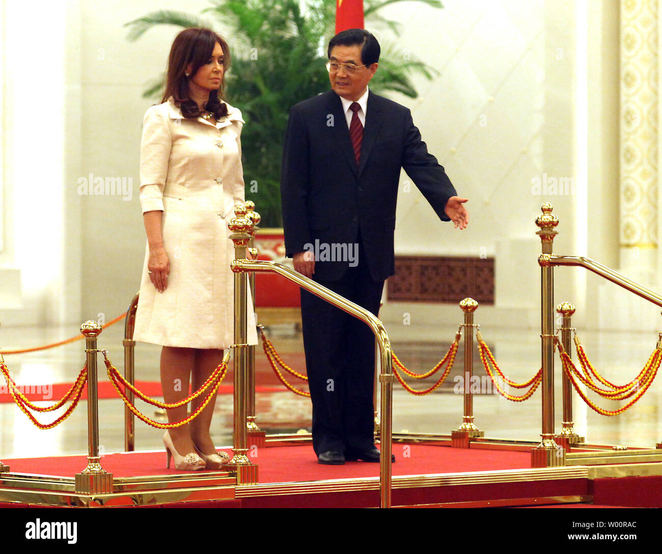Argentina's President Cristina Kirchner de Fernandez (L) is escorted by Chinese President Hu Jintao during a welcoming ceremony at the Great Hall of the People in Beijing on July 13, 2010.  China and Argentina agreed on contracts for railway projects in the South American country totaling 10 billion dollars.    UPI/Stephen Shaver Stock Photo