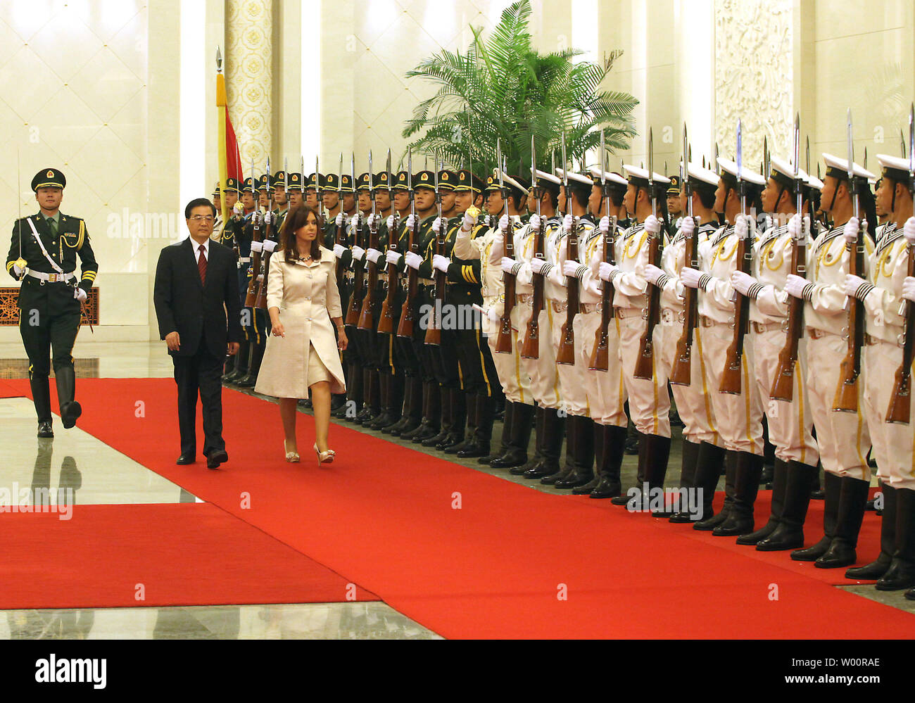 Argentina's President Cristina Kirchner de Fernandez (R)) is escorted by Chinese President Hu Jintao during a welcoming ceremony at the Great Hall of the People in Beijing on July 13, 2010.  China and Argentina agreed on contracts for railway projects in the South American country totaling 10 billion dollars.    UPI/Stephen Shaver Stock Photo
