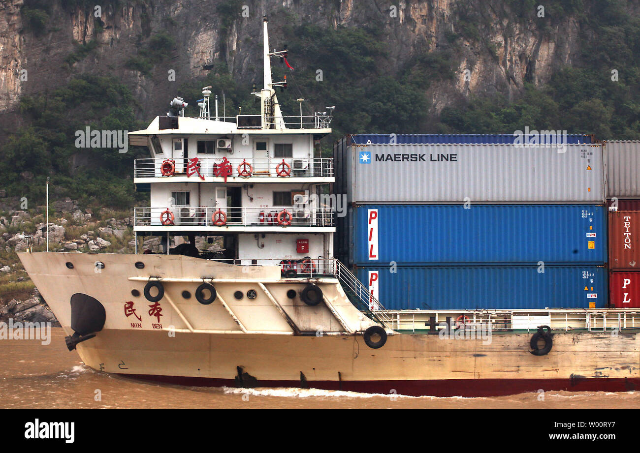 A Chinese container ship travels up the Yangtze River in Sichuan ...