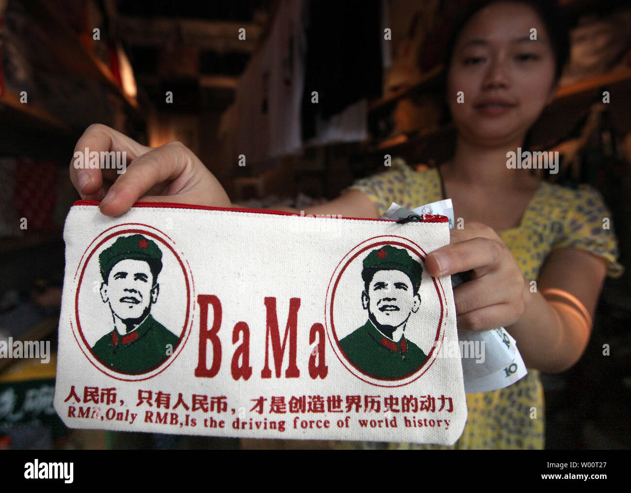 Money wallets and bags featuring U.S. President Barack Obama dressed in the Red Army communist fatigues of China's former helmsman Chairman Mao Zedong are being sold in shops in Beijing, September 14, 2010.  'Oba-Mao' t-shirts and accessories are big sellers in Beijing due to Obama's unflagging popularity among many Chinese.    UPI/Stephen Shaver Stock Photo