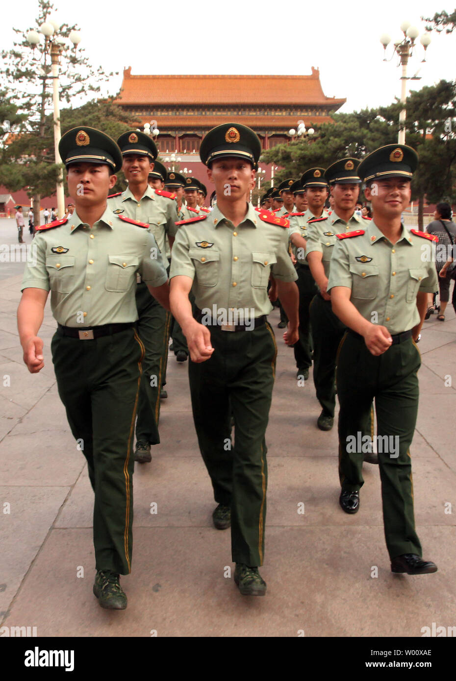 Chinese People's Liberation Army soldiers march to their barracks near Tiananmen Square in central Beijing on June 3, 2011.  China's capital is under heavy security in the lead up to the June 4 anniversary of the 1989 government crackdown on pro-democracy protests, which killed thousands of unarmed students.      UPI/Stephen Shaver Stock Photo