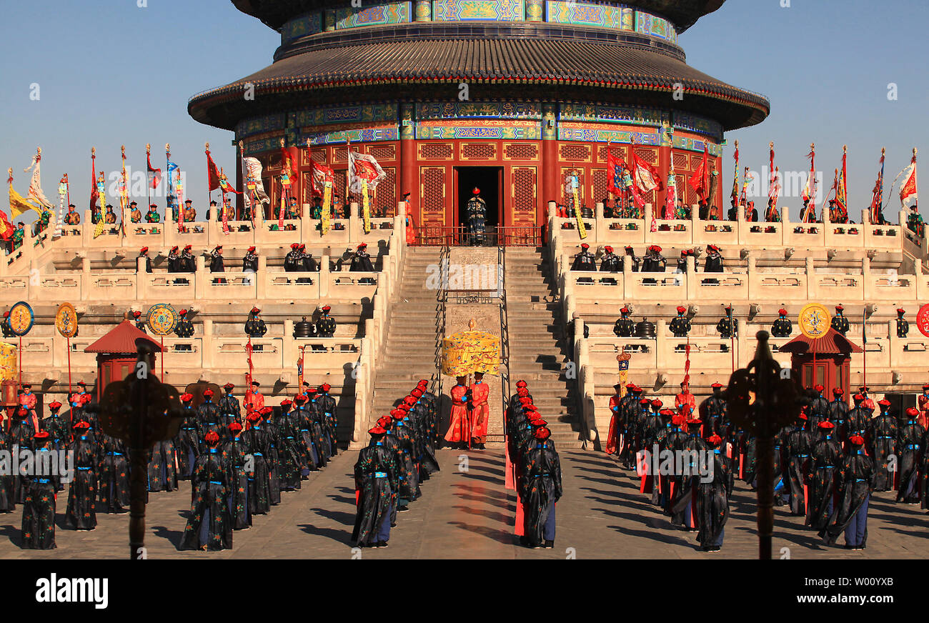 Chinese performers take part in a traditional Qing Dynasty ceremony, in ...