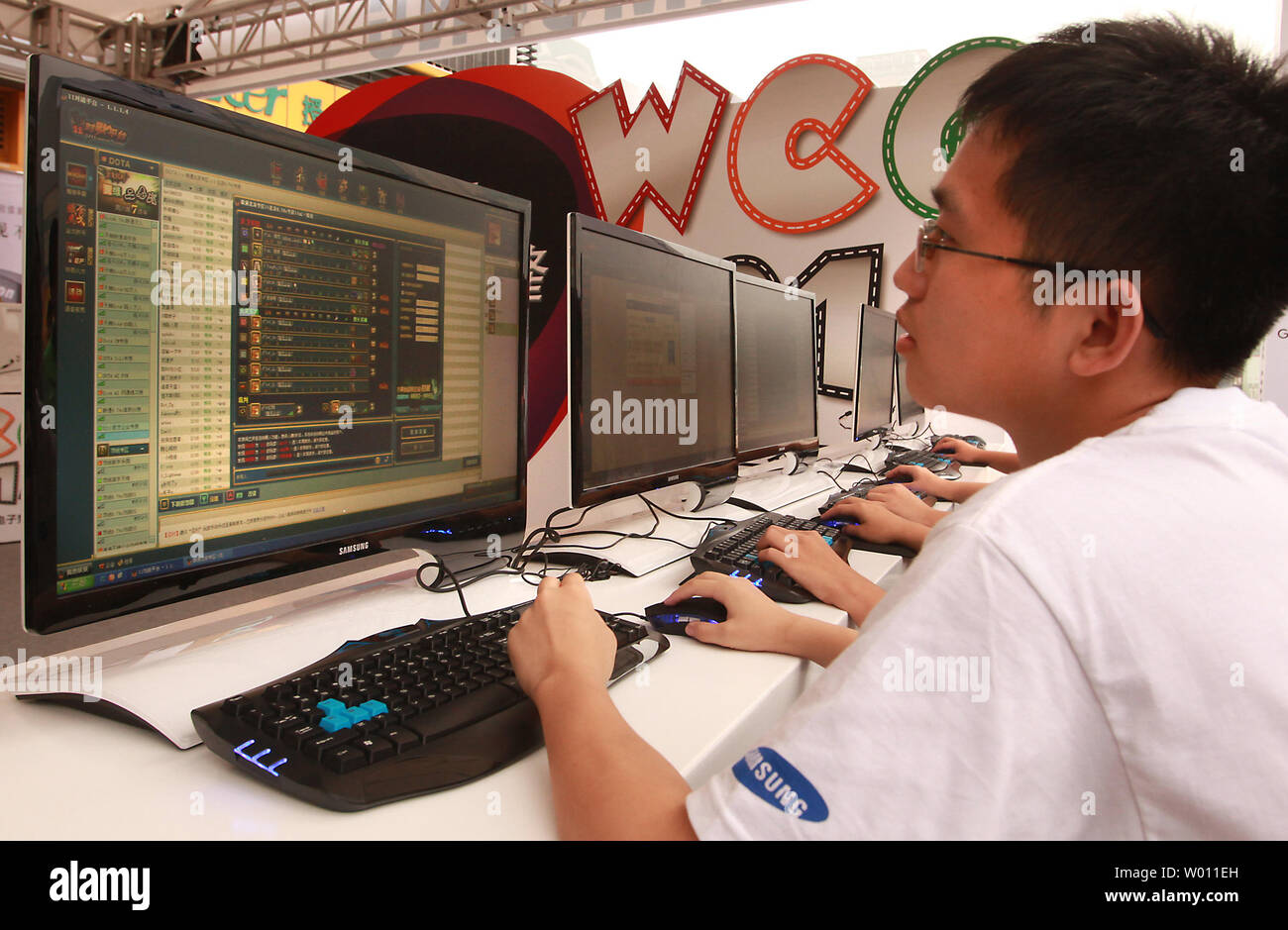 Chinese students compete in a cyber war-game contest in downtown Beijing on August 26, 2012.  Cyber crime in China poses a serious threat to the fast-growing economy and it is likely that such attacks, already costing in excess of US$850 billion a year, will only increase.    UPI/Stephen Shaver Stock Photo