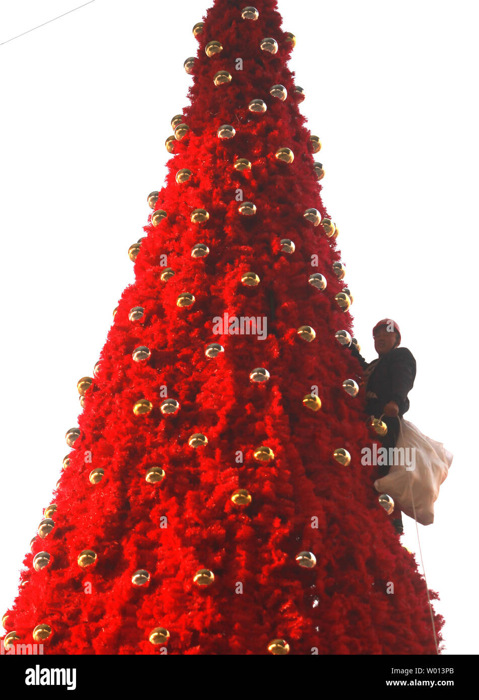 Chinese Migrant Workers Set Up Christmas Decorations At An International Shopping Mall In Downtown Beijing On November 26 2013 Western Holidays Regardless Of Their Religious And Cultural Significance Are Growing In Popularity