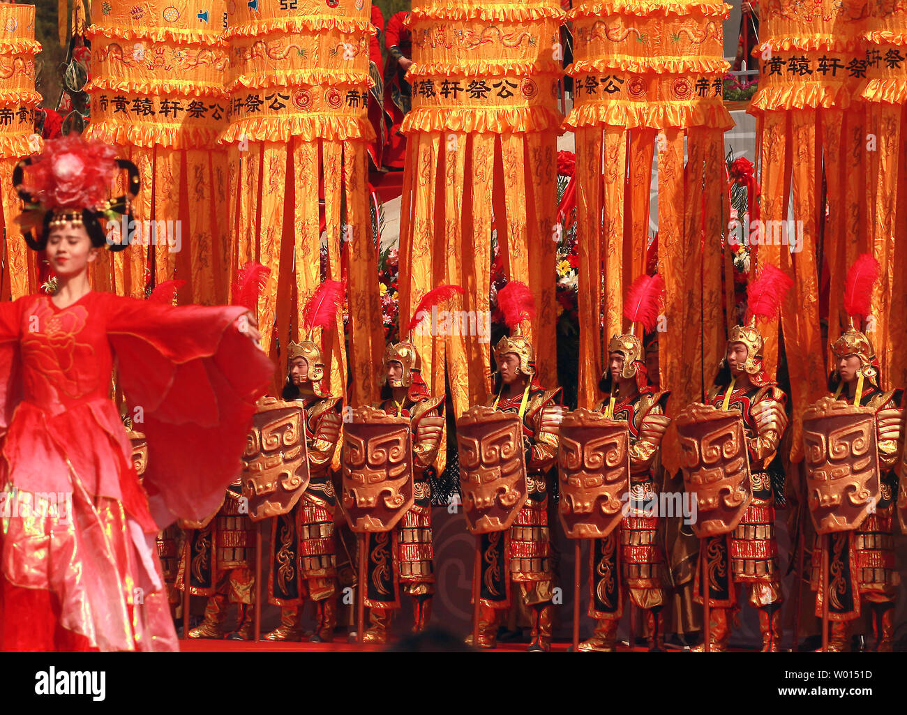 Thousands of Chinese performers, government and business representatives, security and tourists take part in the annual Tomb Sweeping memorial ceremony for China's Yellow Emperor outside of Xian in Huangling County, Shaanxi Province, on April 5, 2014.  The ceremony celebrates the legendary emperor, known as Huangdi and a common ancestor of all Chinese, at his tomb with prayers and ancient rituals.   UPI/Stephen Shaver Stock Photo