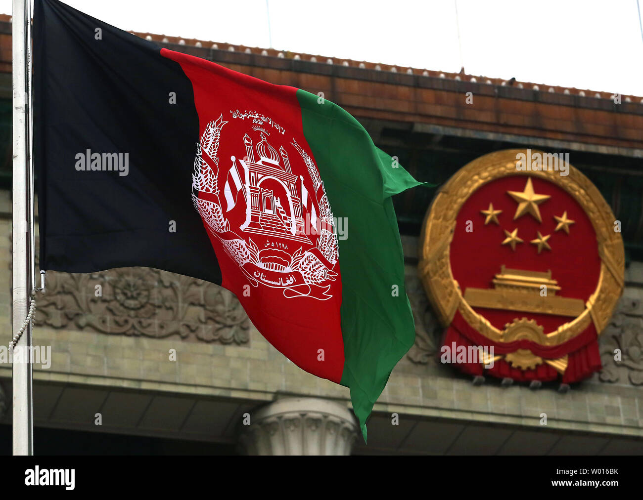 Afghanistan's national flag greets the new Afghan President Ashraf Ghani Ahmadzai and Chinese President Xi Jinping as they attend a welcoming ceremony at the Great Hall of the People in Beijing on October 28, 2014.  The Afghan President is visiting China to seek help in rebuilding his country and boosting regional stability.       UPI/Stephen Shaver Stock Photo