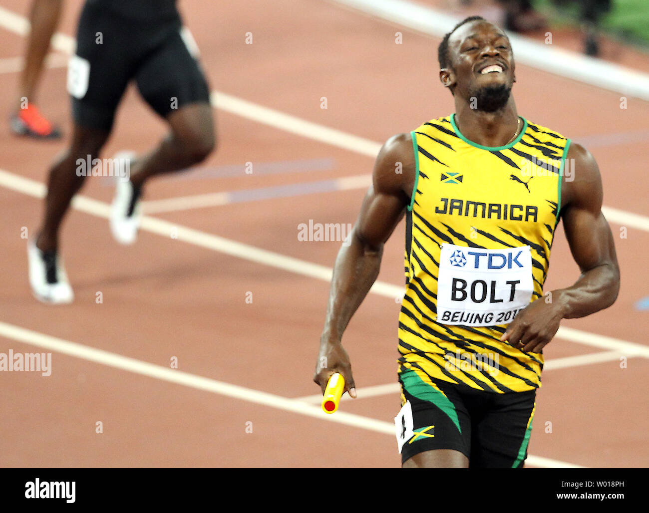 Jamaica takes first as Usain Bolt crosses the finish line in the 4x100 meters relay final at the IAAF World Championships being hosted by Beijing on August 29, 2015.  Jamaica won with a time of 37.36 seconds, followed by China (38.01) and Canada (38.13) in third.  USA was disqualified.   Photo by Stephen Shaver/UPI Stock Photo