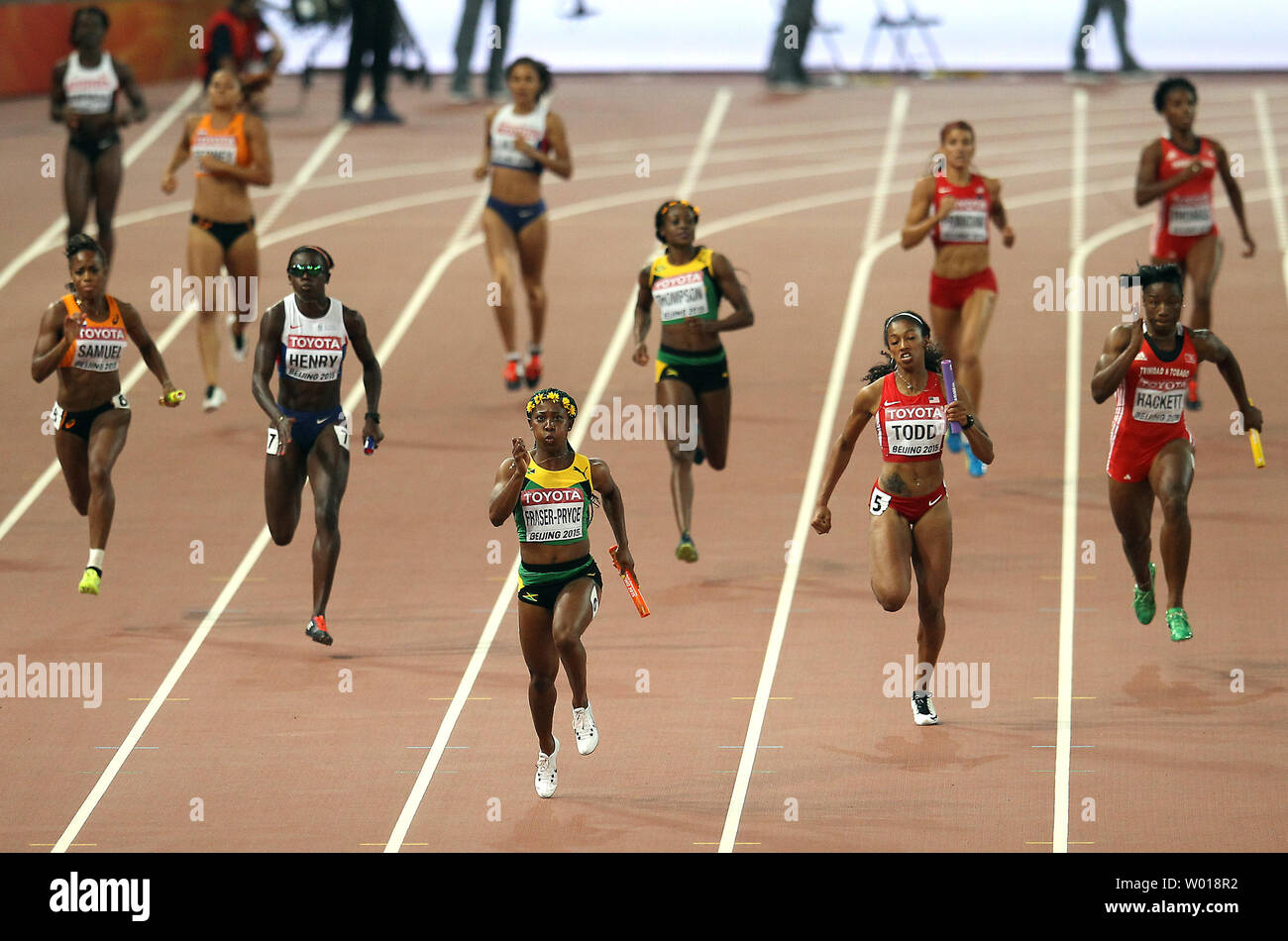 (L-R) Netherlands, Great Britain, Jamaica, USA and Trinidad and Tobago compete in the 4x100 meters women's relay final at the IAAF World Championships being hosted by Beijing on August 29, 2015.  Jamaica won with a time of 41.07 seconds, followed by USA (41.68) and Trinidad and Tobago (42.03) in third.      Photo by Stephen Shaver/UPI Stock Photo