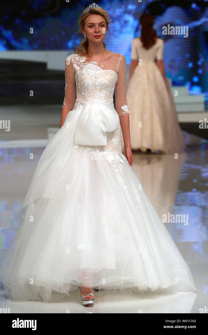 Models Wear Dresses Made By Chinese Fashion Designer Ren Chunhua
