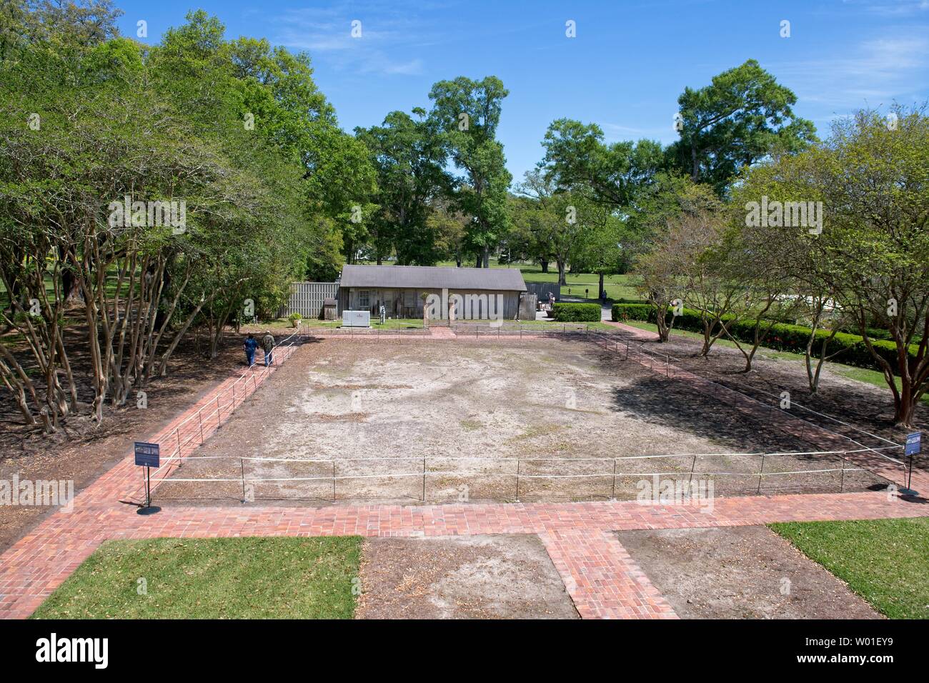 Garden area with brick walk path at Oak Alley Plantation a historic former site of a sugarcane plantation Stock Photo