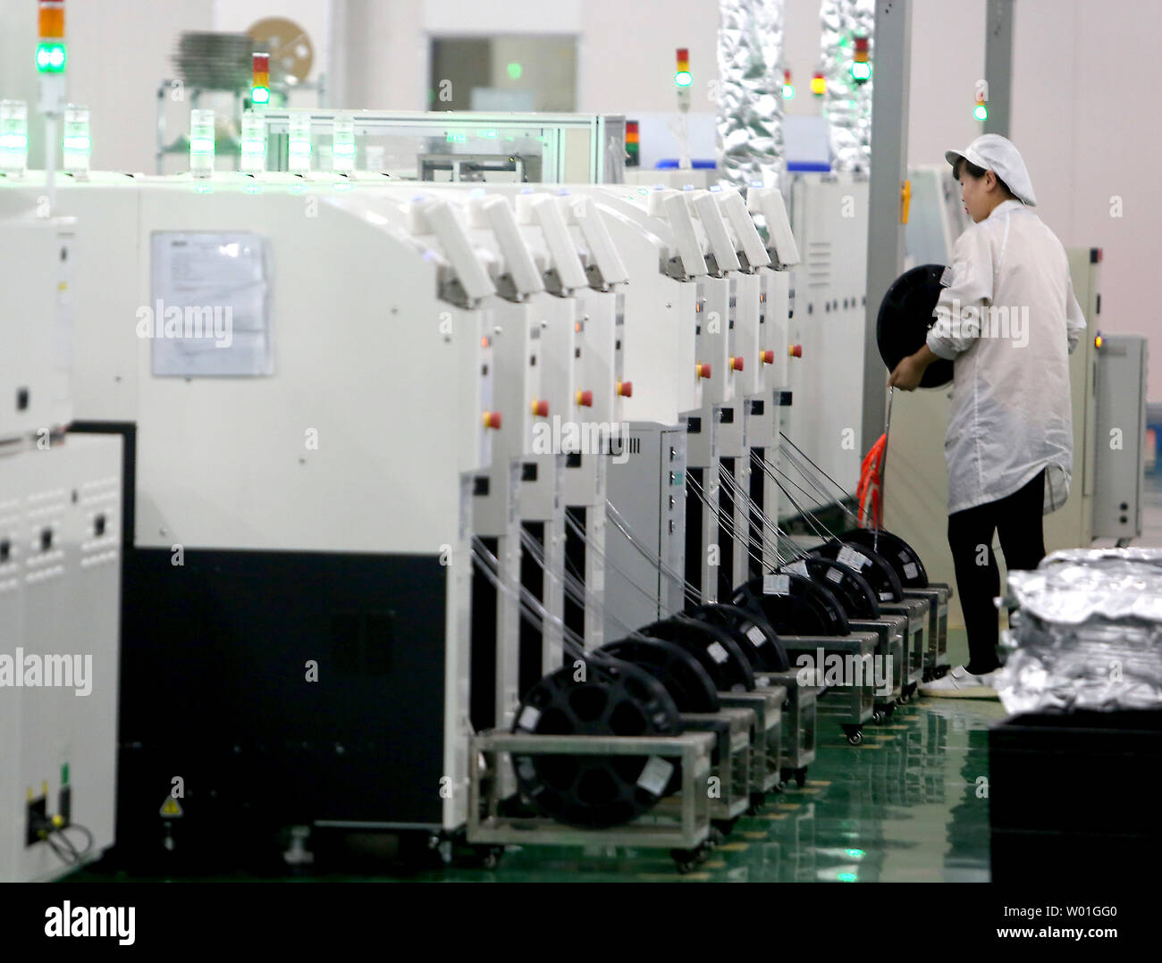 Chinese work at the Shanxi high-tech Huaye Electronic Group's factory in Taiyuan, Shanxi Province, on December 30, 2018.  Huaye specializes in manufacturing and exporting LED displays.    Photo by Stephen Shaver/UPI Stock Photo