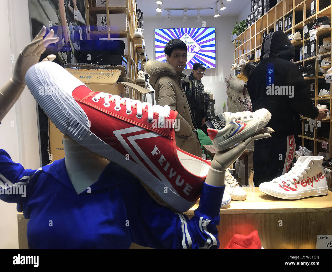 Chinese shop for shoes, domestically made but closely resembling U.S.  Converse, in Beijing on February 18, 2019. Many of the U.S.'s complaints  against China involve intellectual property rights (IPR), copyright and  patent