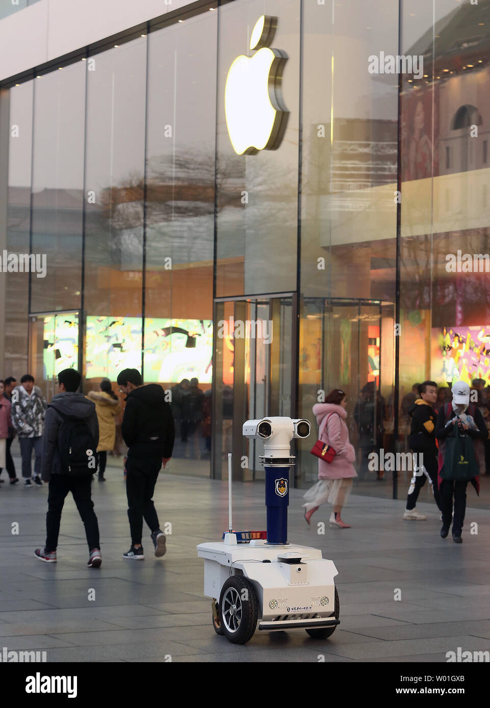 A police surveillance robot keeps watch on crowds on the streets of downtown Beijing on February 27, 2019.  China's capital is ratcheting up security in popular tourist and shopping areas as the government's leaders are due to hold the annual Congress next week.   Photo by Stephen Shaver/UPI Stock Photo