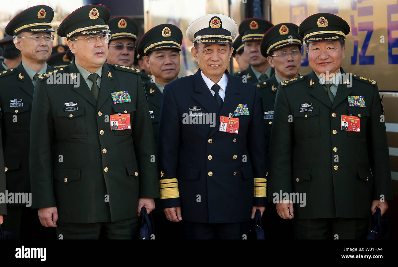 chinese-military-delegates-arrive-for-the-closing-ceremony-of-the-13th-national-peoples-congress-in-the-great-hall-of-the-people-in-beijing-on-march-15-2019-chinas-top-leaders-and-delegates-voted-on-various-laws-during-the-annual-meeting-of-chinas-legislature-photo-by-stephen-shaverupi-W01HA4.jpg