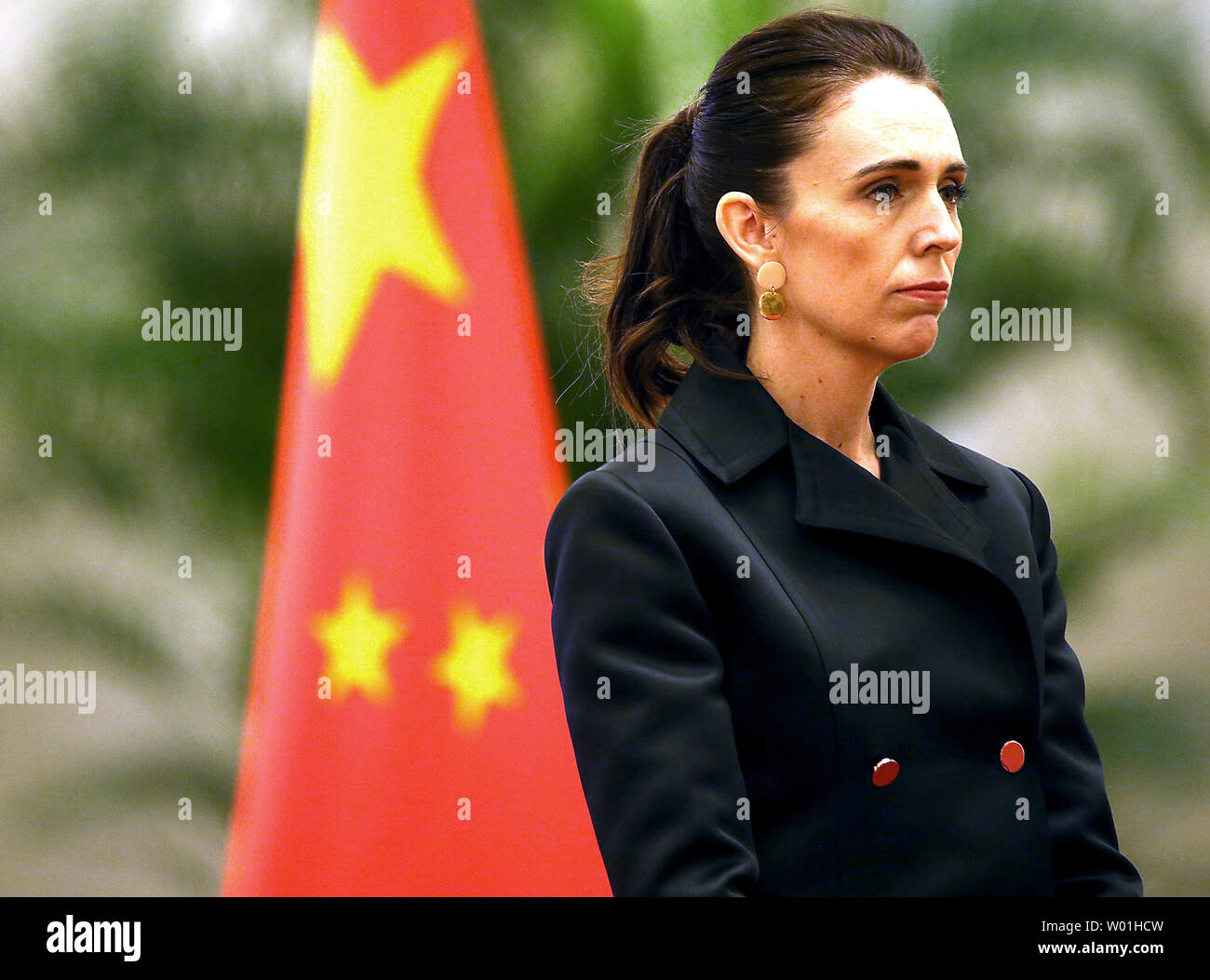 New Zealand (NZ) Prime Minister Jacinda Ardern listens to her national anthem during a welcoming ceremony at the Great Hall of the People in Beijing on April 1, 2019.  China and NZ signed agreements on eliminating double taxation and tax avoidance as the two countries look to reset economic relations.   Photo by Stephen Shaver/UPI Stock Photo