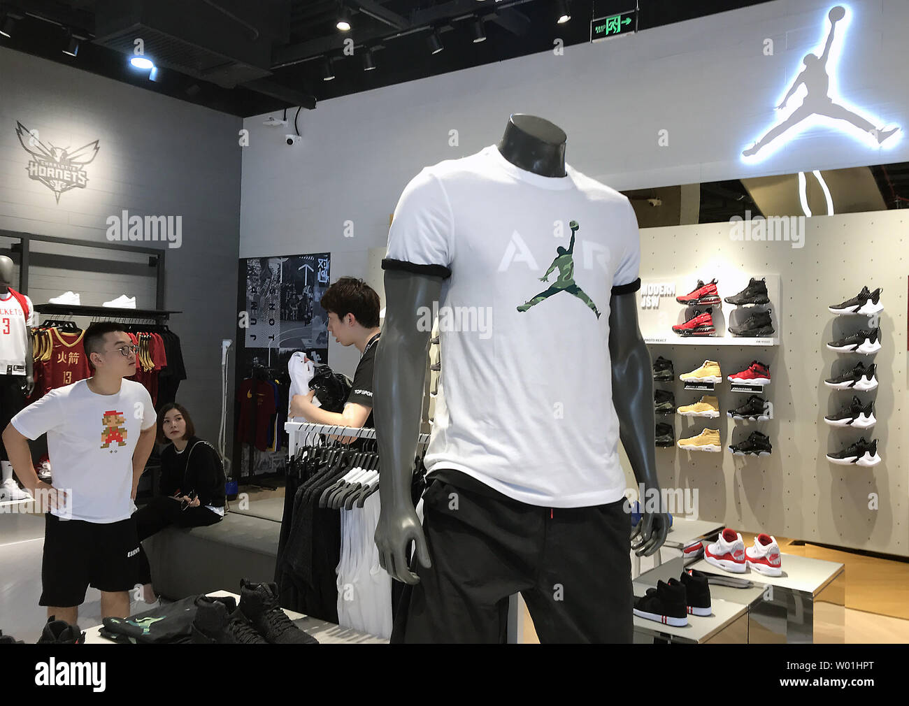 SHENZHEN, CHINA - CIRCA APRIL, 2019: Clothes On Display At NBA Style Store  In Shenzhen. Stock Photo, Picture and Royalty Free Image. Image 135604237.