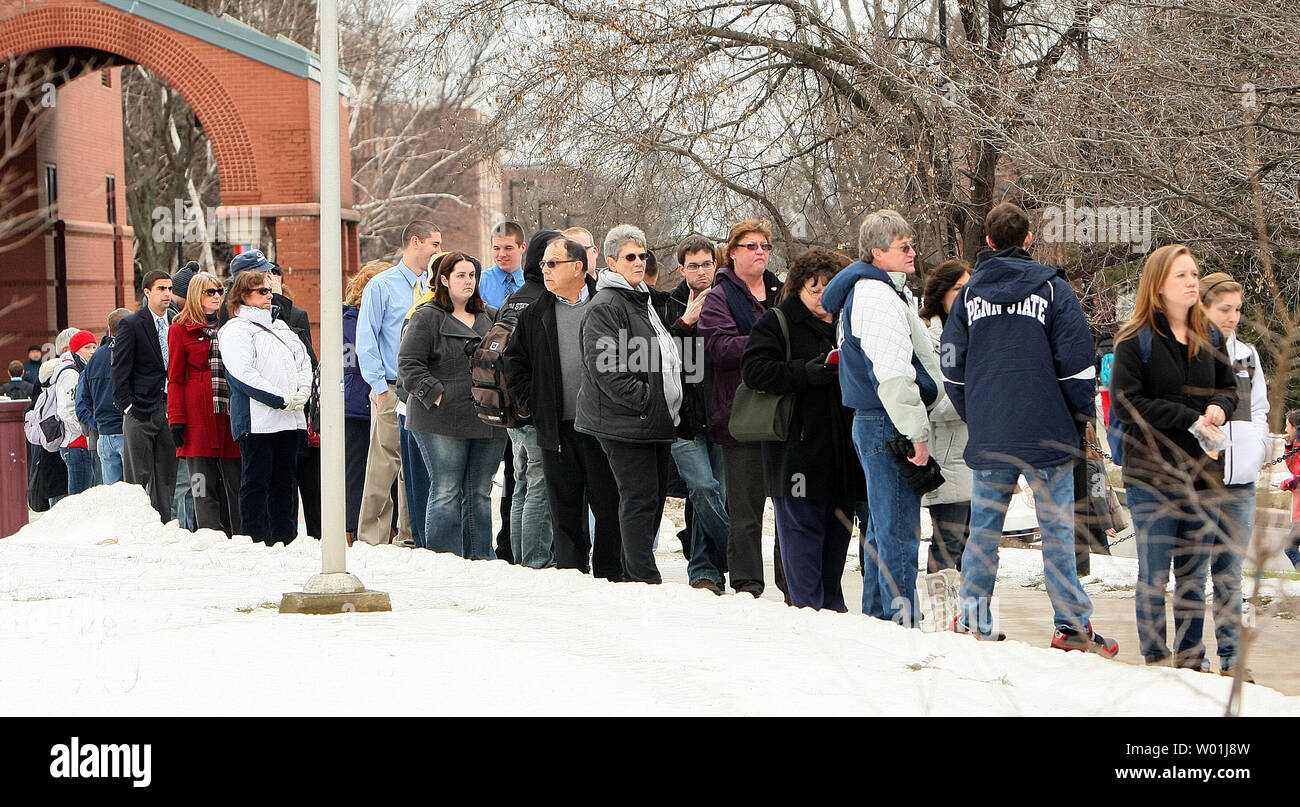 Mourners wait in line to pay their request to Penn State football coach Joe Paterno at a viewing at the Eisenhower Chapel in State College, Pennsylvania on January 24, 2012. Paterno died after a short battle with lung cancer. UPI/George Powers Stock Photo