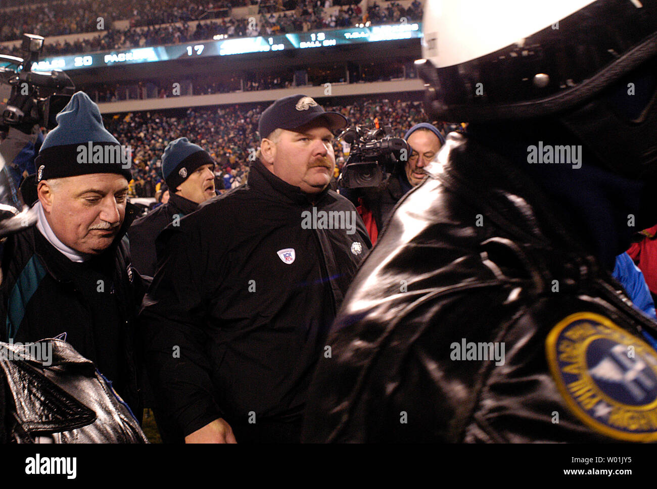 Eagles coach Andy Reid makes his way off the field following the Eagles 20 to 17 overtime victory over the Packersas Philadelphia hosts Green Bay in a divisional playoff game at the Lincoln Financial Field in Philadelphia, on January 11, 2004.  (UPI Photo/Jon Adams) Stock Photo