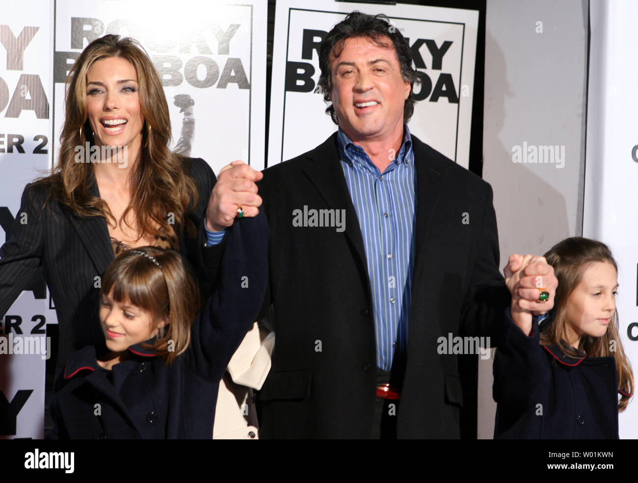 Actor/director Sylvester Stallone arrives with wife Jennifer Flavin and two of his daughters, Sofia Rose and Sistine Rose (far right) for the Philadelphia premier of 'Rocky Balboa' at the Prince Music Theater in Philadelphia December 18, 2006. The movie is the sixth and final installment of the Rocky movie series and was shot mostly in Philadelphia.   (UPI Photo/John Anderson) Stock Photo