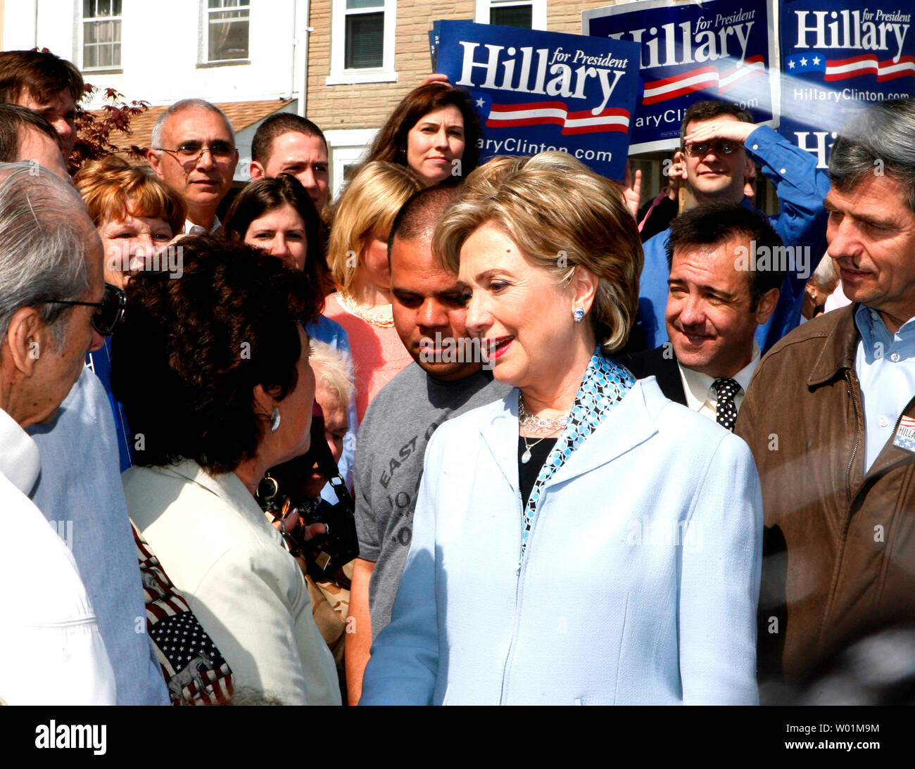 Democratic Presidential candidate Hillary Clinton talks with voters waiting to vote at a polling place in Conshohoken, Pennsylvania, on April 22, 2008. She was making some last minute campaign stops as voters went to the polls for the Pennsylvania Primary.    (UPI Photo/John Anderson) Stock Photo